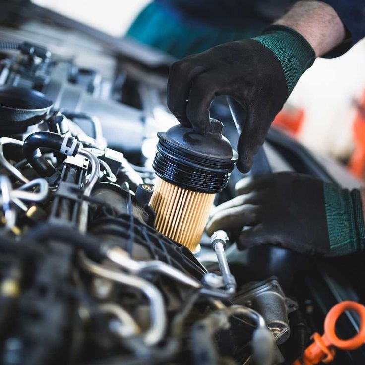 Fuel filter element in diesel or gasoline vehicle service bay